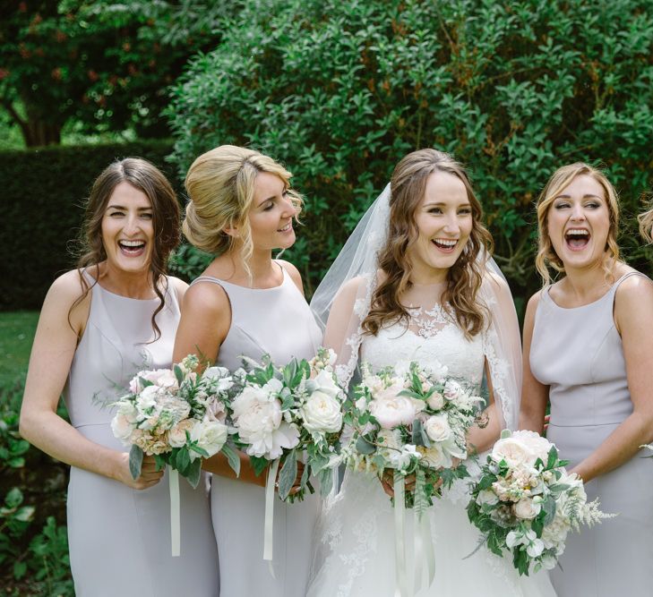 Bridesmaids in Taupe Dessy Dresses | Elegant Notley Abbey Wedding | Natalie J Weddings Photography