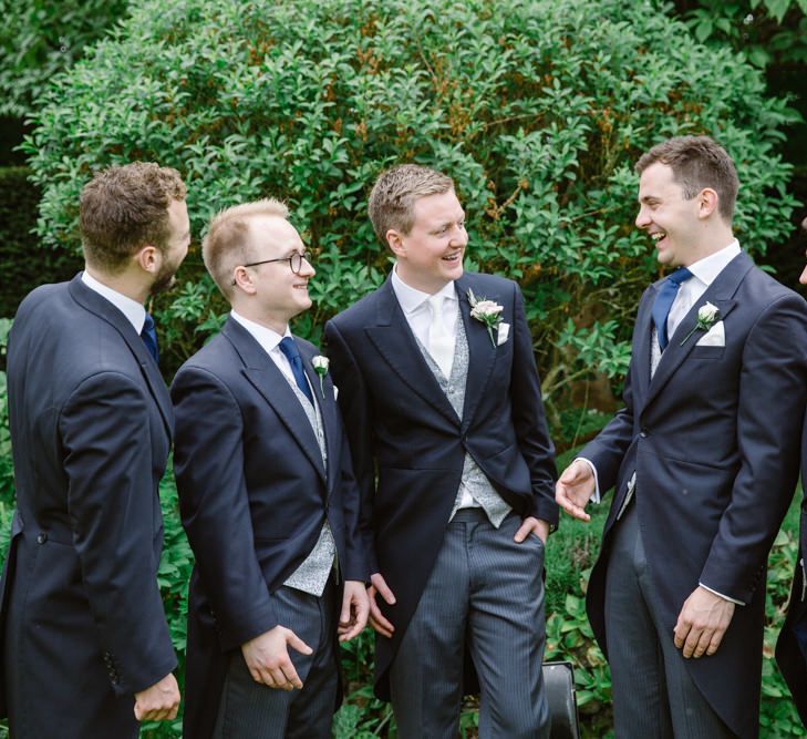 Groomsmen in Moss Bros Suits | Elegant Notley Abbey Wedding | Natalie J Weddings Photography