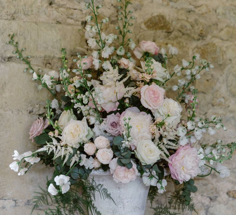 Romantic Pink Floral Arrangement | Elegant Notley Abbey Wedding | Natalie J Weddings Photography