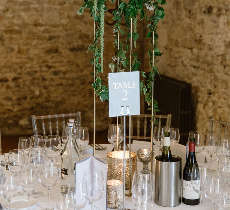 Tall Floral Centrepiece | Elegant Notley Abbey Wedding | Natalie J Weddings Photography