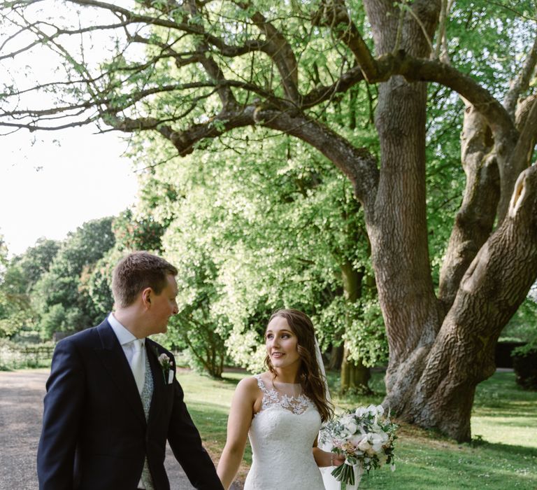 Bride in Pronovias Gown | Groom in Moss Bros Suit | Elegant Notley Abbey Wedding | Natalie J Weddings Photography