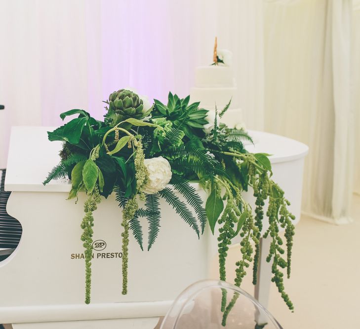 White Grand Piano At Wedding