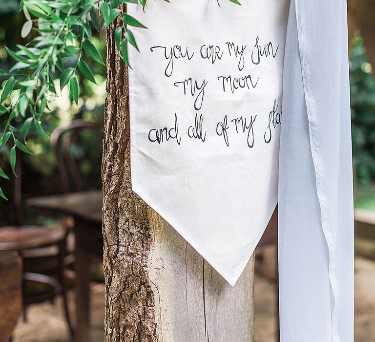 Inspirational Flag Quote Wedding Decor | Marble, Copper & Greenery Wedding at Cripps Barn Cotswolds | Summer Lily Studio Photography