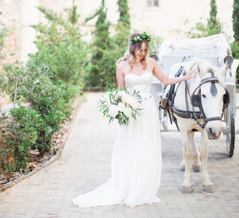 Bride in BHLDN Wedding Dress | House & Carriage | Intimate Outdoor Destination Wedding at Kinsterna Hotel & Spa in Greece | Cecelina Photography