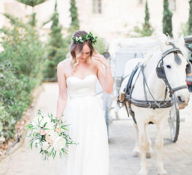 Bride in BHLDN Wedding Dress | House & Carriage | Intimate Outdoor Destination Wedding at Kinsterna Hotel & Spa in Greece | Cecelina Photography