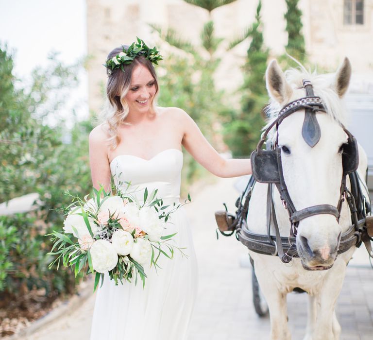 Bride in BHLDN Wedding Dress | House & Carriage | Intimate Outdoor Destination Wedding at Kinsterna Hotel & Spa in Greece | Cecelina Photography