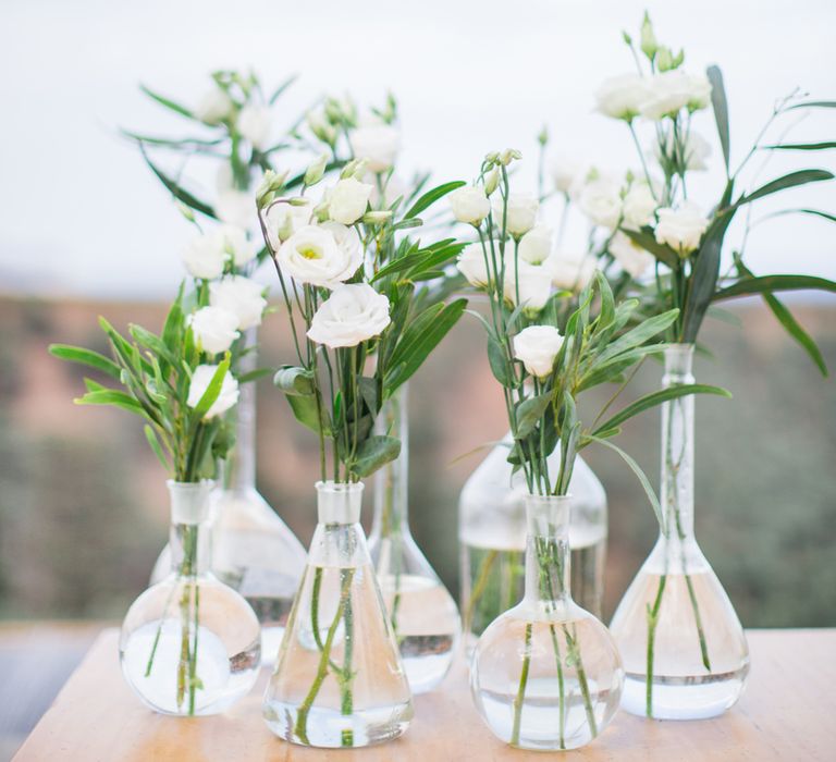 White Flower Stems inVases | Intimate Outdoor Destination Wedding at Kinsterna Hotel & Spa in Greece | Cecelina Photography