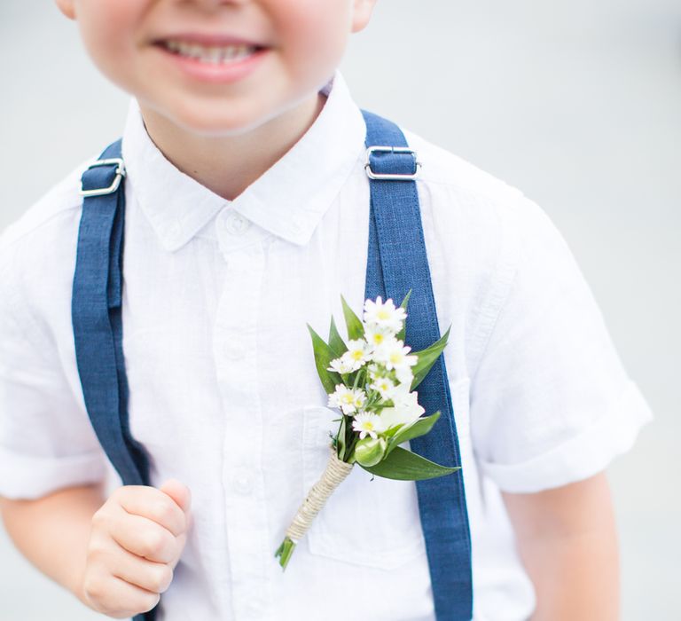 Page Boy Buttonhole | Intimate Outdoor Destination Wedding at Kinsterna Hotel & Spa in Greece | Cecelina Photography