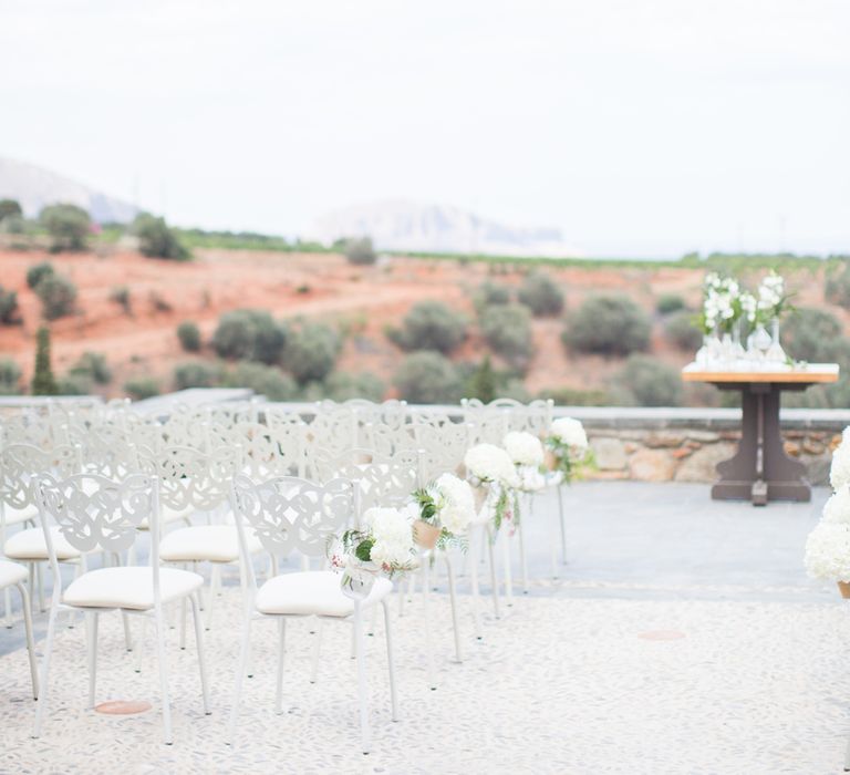 Aisle & Altar | Intimate Outdoor Destination Wedding at Kinsterna Hotel & Spa in Greece | Cecelina Photography