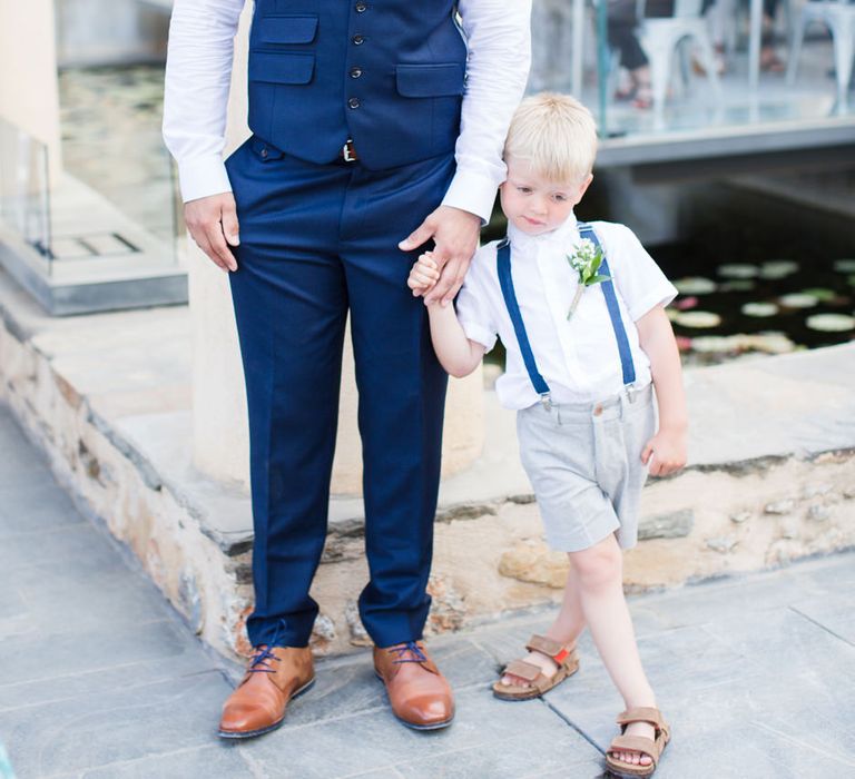 Groom in Navy Blue Ted Baker Suit & Page Boy in Shorts & Braces | Intimate Outdoor Destination Wedding at Kinsterna Hotel & Spa in Greece | Cecelina Photography