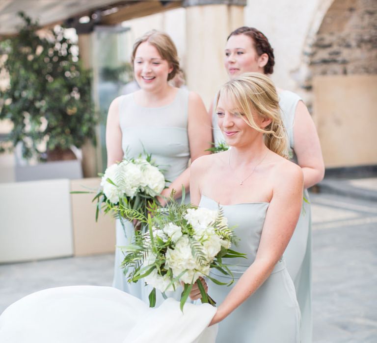 Bridesmaids in Pale Blue House of Fraser Dresses | Intimate Outdoor Destination Wedding at Kinsterna Hotel & Spa in Greece | Cecelina Photography