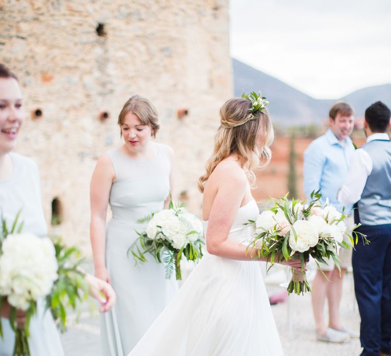 Bride in BHLDN Wedding Dress | Bridesmaids in House of Fraser Dresses | Intimate Outdoor Destination Wedding at Kinsterna Hotel & Spa in Greece | Cecelina Photography