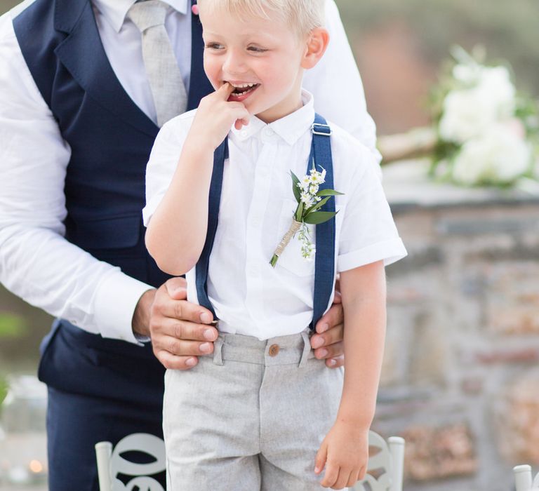 Groom in Ted Baker Navy Suit | Page Boy in Shiorts & Braces | Intimate Outdoor Destination Wedding at Kinsterna Hotel & Spa in Greece | Cecelina Photography