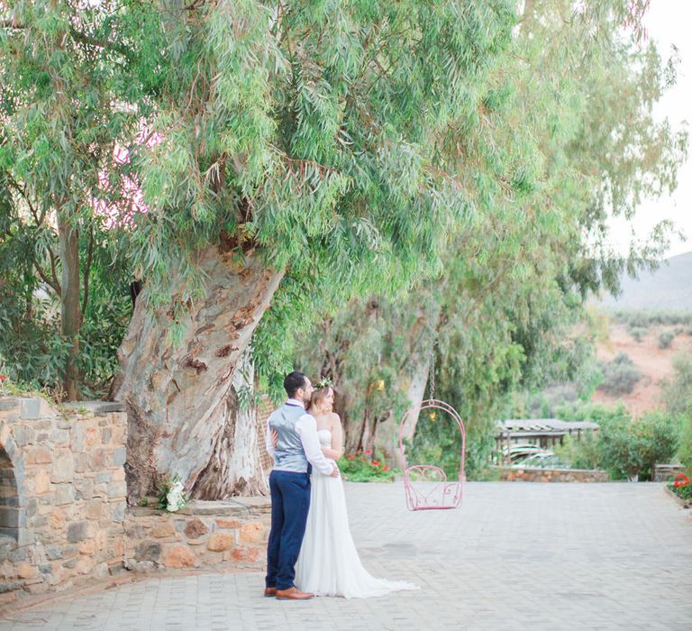 Bride in BHLDN Wedding Dress | Groom in Blue Ted Baker Suit | Kinsterna Hotel & Spa in Greece | Cecelina Photography