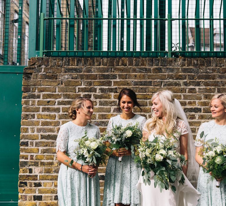 Bridesmaids in Mint Green High Low Lace ASOS Dresses | Bride in Alice Temperley Bluebell Gown | Stylish London Wedding | Eclection Photography