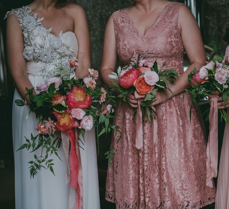 Peony & Rose Bouquets | Coral Wedding Cake with Peony Decor | Bride in Anna Campbell Gown from Coco & Kate Boutique | Groom in Next Wool Suit | Rustic Barn Pink Summer Wedding at Nancarrow Farm in Cornwall | Ross Talling Photography