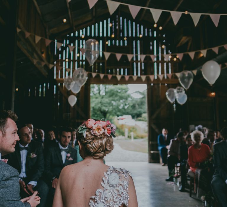 Wedding Ceremony | Bride in Anna Campbell Gown | Groom in Grey Wool Suit | Coral Wedding Cake with Peony Decor | Bride in Anna Campbell Gown from Coco & Kate Boutique | Groom in Next Wool Suit | Rustic Barn Pink Summer Wedding at Nancarrow Farm in Cornwall | Ross Talling Photography