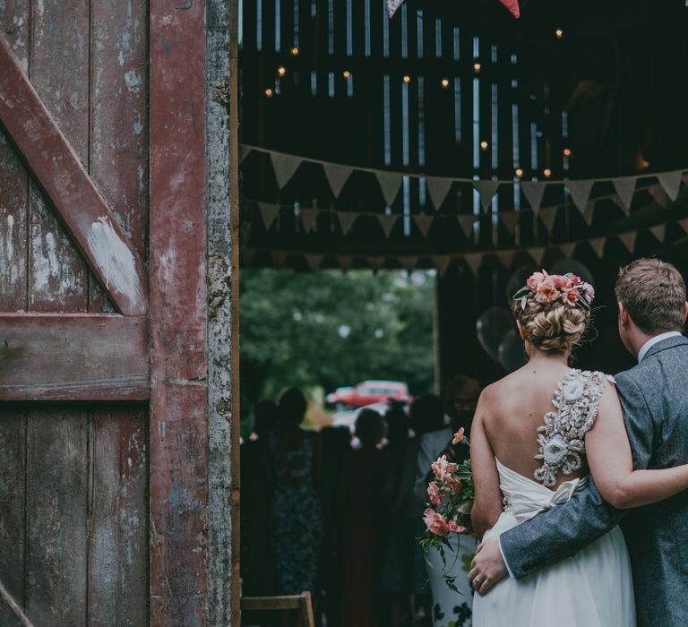 Bride in Anna Campbell Gown | Groom in Grey Wool Suit | Coral Wedding Cake with Peony Decor | Bride in Anna Campbell Gown from Coco & Kate Boutique | Groom in Next Wool Suit | Rustic Barn Pink Summer Wedding at Nancarrow Farm in Cornwall | Ross Talling Photography