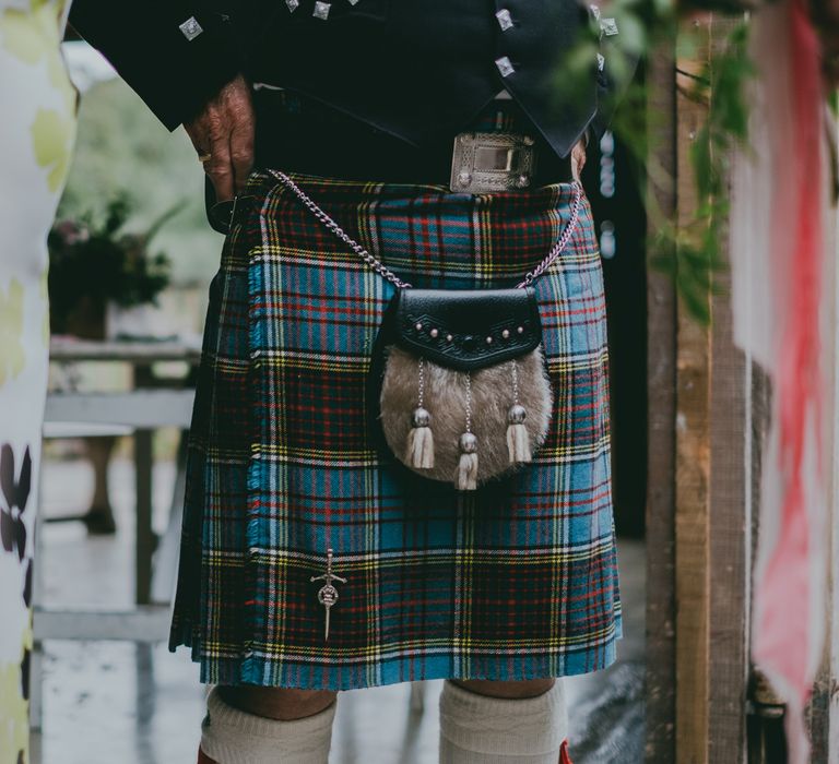 Tartan Kilt | Coral Wedding Cake with Peony Decor | Bride in Anna Campbell Gown from Coco & Kate Boutique | Groom in Next Wool Suit | Rustic Barn Pink Summer Wedding at Nancarrow Farm in Cornwall | Ross Talling Photography