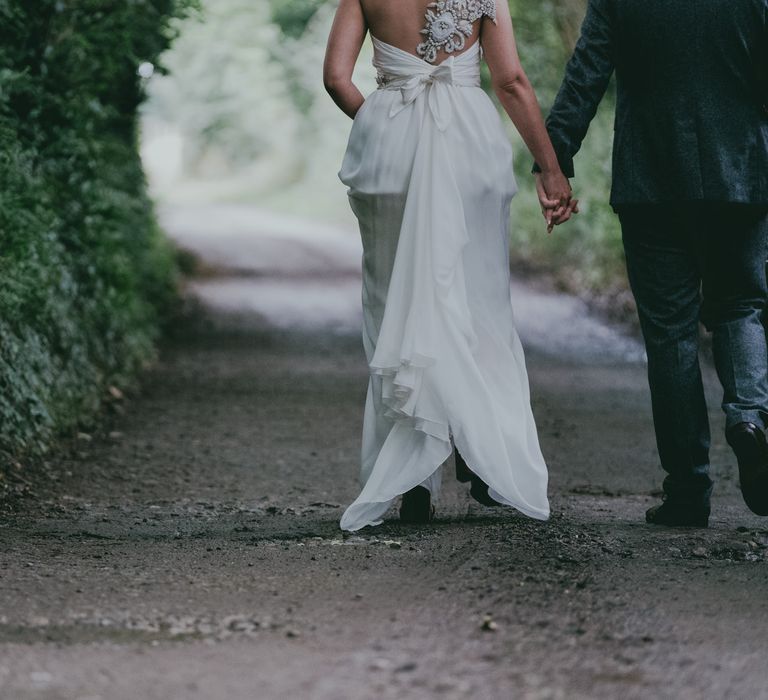 Bride in Anna Campbell Gown from Coco & Kate Boutique | Groom in Next Wool Suit | Rustic Barn Pink Summer Wedding at Nancarrow Farm in Cornwall | Ross Talling Photography