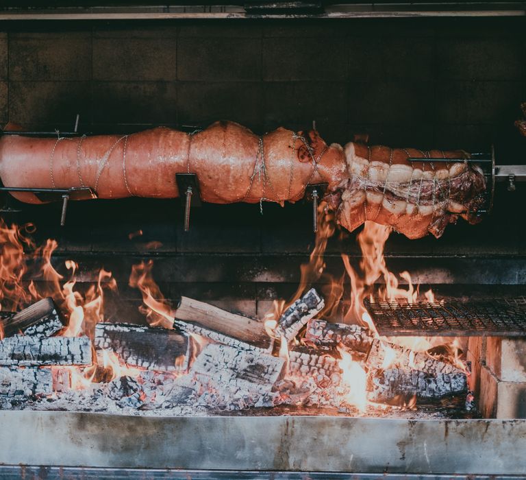 BBQ | Bride in Anna Campbell Gown from Coco & Kate Boutique | Groom in Next Wool Suit | Rustic Barn Pink Summer Wedding at Nancarrow Farm in Cornwall | Ross Talling Photography