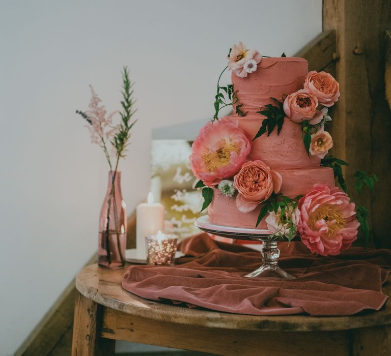 Coral Wedding Cake with Peony Decor | Bride in Anna Campbell Gown from Coco & Kate Boutique | Groom in Next Wool Suit | Rustic Barn Pink Summer Wedding at Nancarrow Farm in Cornwall | Ross Talling Photography