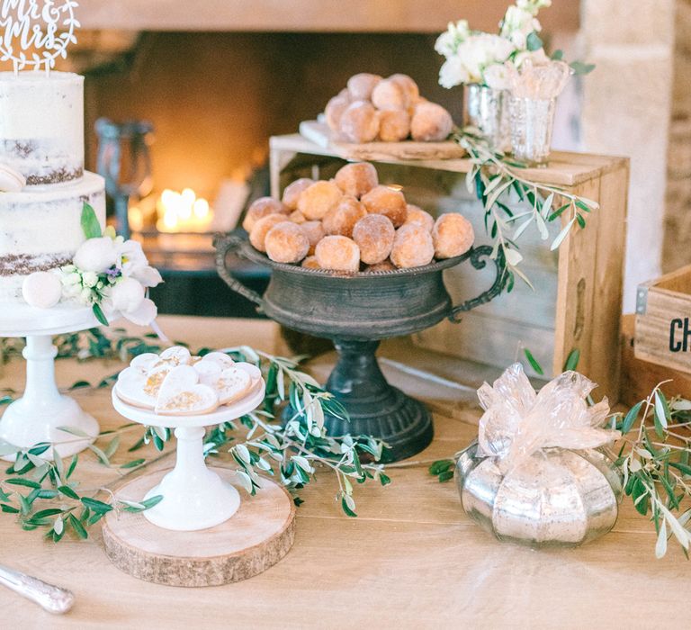 Epic Dessert Table For Wedding With Lots Of Foliage