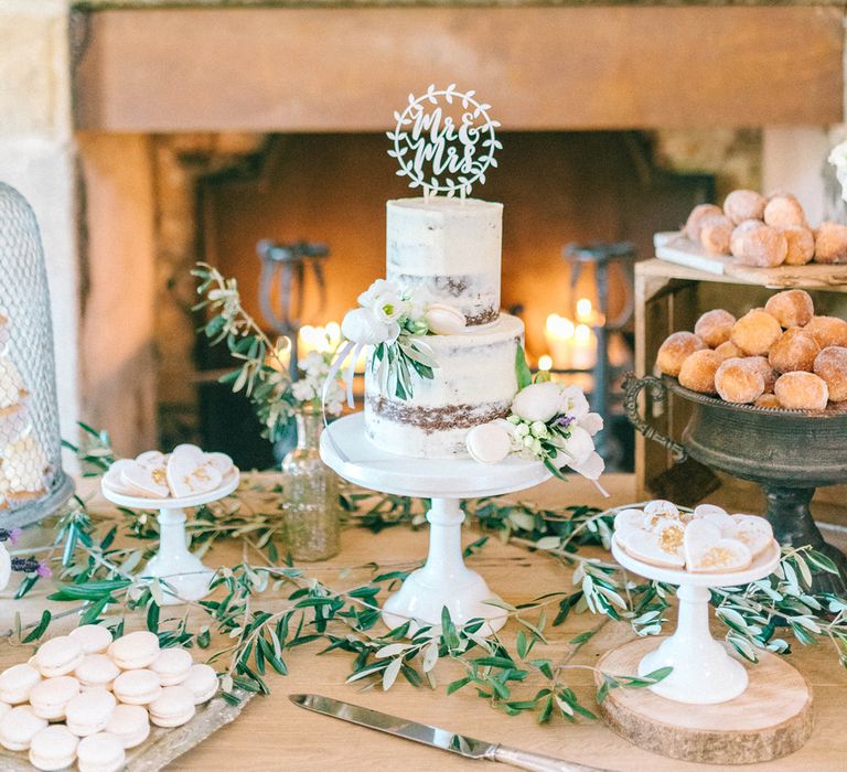 Epic Dessert Table For Wedding With Lots Of Foliage