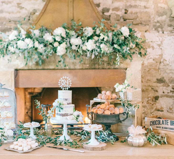 Epic Dessert Table For Wedding With Lots Of Foliage