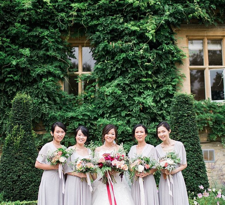 Bride in Renee L. Collections Gown | Bridesmaids in Grey Love Potion Dresses | Jacob & Pauline Photography | Pretty in White Films