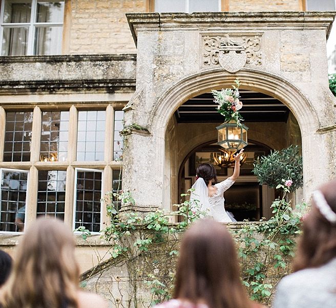 Bouquet Toss at The Slaughters Manor House | Jacob & Pauline Photography | Pretty in White Films