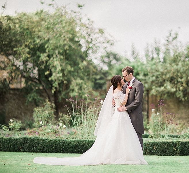 Bride in Renee L. Collections Gown | Groom in Moss Bros Traditional Suit | Jacob & Pauline Photography | Pretty in White Films