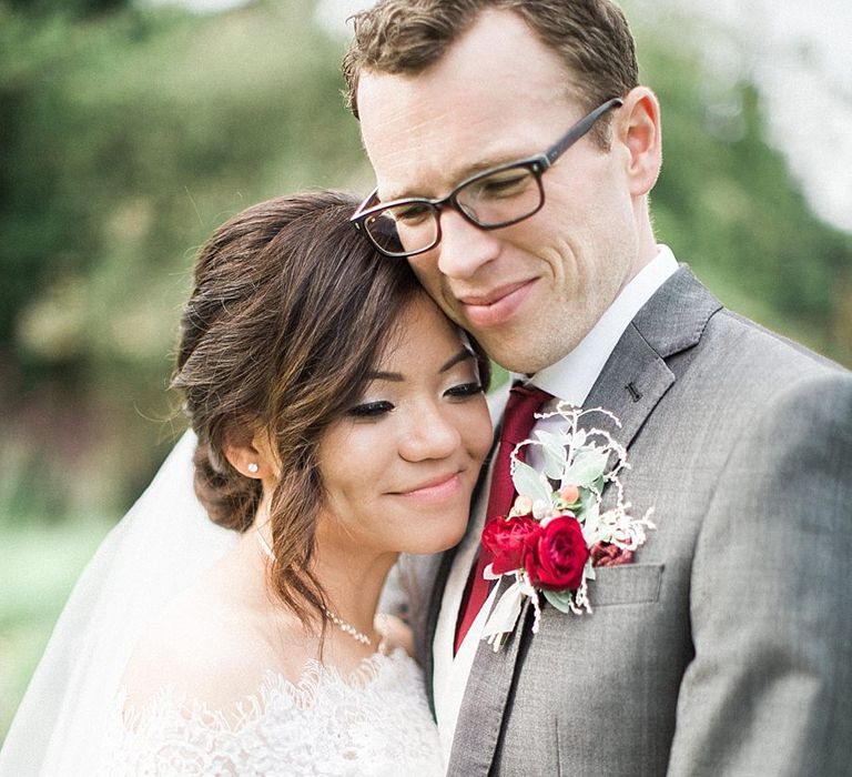 Bride in Renee L. Collections Gown | Groom in Moss Bros Traditional Suit | Jacob & Pauline Photography | Pretty in White Films