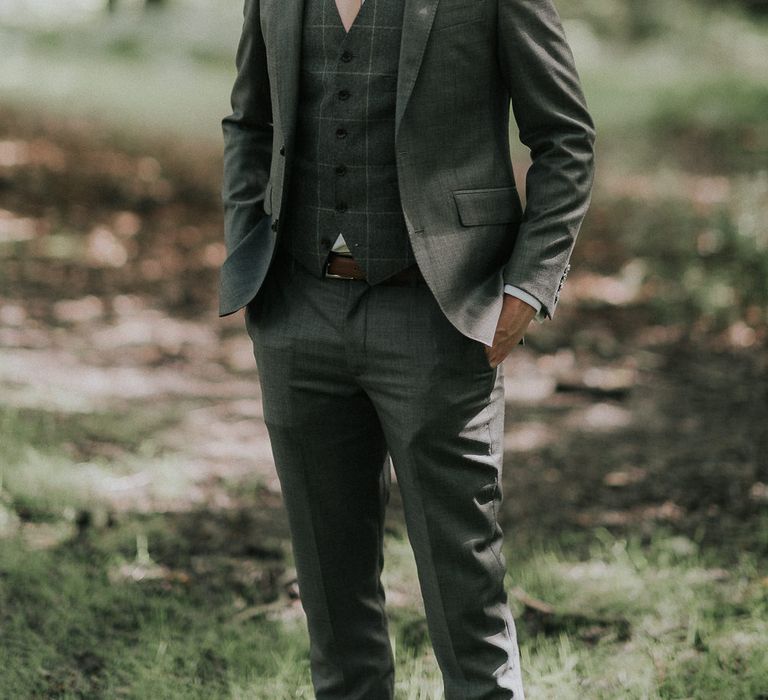 Groom in Grey Hackett in London Suit