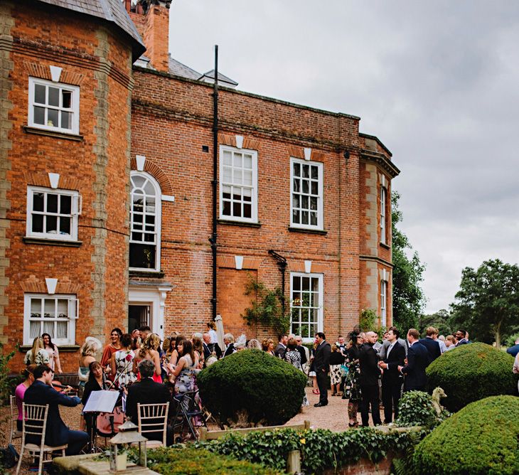 Elegant White Wedding At Iscoyd Park With Bride In Pronovias & Blossom Tree Installation Marquee With Images From Steve Gerrard Photography