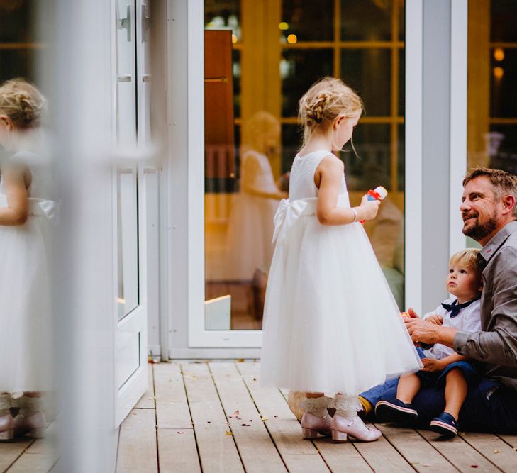 Flower Girl In White Dress Image By Steve Gerrard Photography