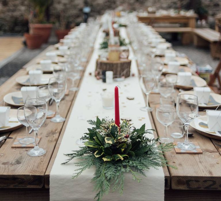 Christmas Wedding Styling Rustic Wooden Tables & Red Candles With Foliage