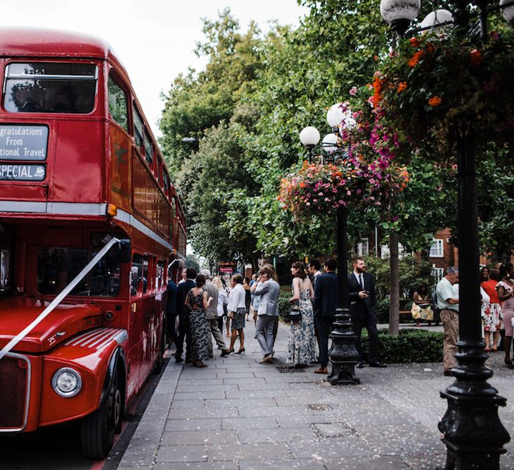 Red London Bus For Wedding Transport // Jenny Packham Bride For A Relaxed Garden Party Style Wedding At Bourne & Hollingsworth Building With Bridesmaids In Coast Separates Images From Through The Woods We Ran