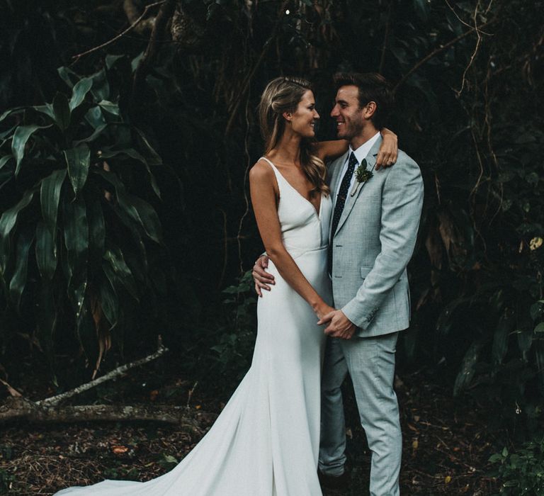 Bride in Bespoke Julia Ferrandi Backless Wedding Gown | Groom in Grey Woolworth Suit | Outdoor Woodland Wedding in South Africa | Michigan Behn Photography