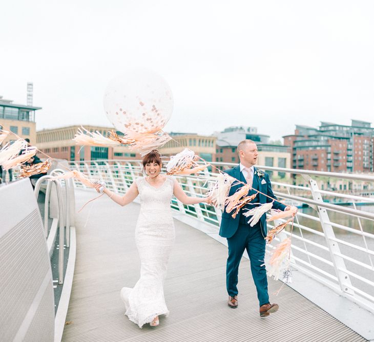 Giant Balloons & Tassels Bride & Groom Portrait