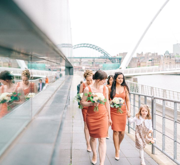 Bridesmaids in Coral Reiss Dresses