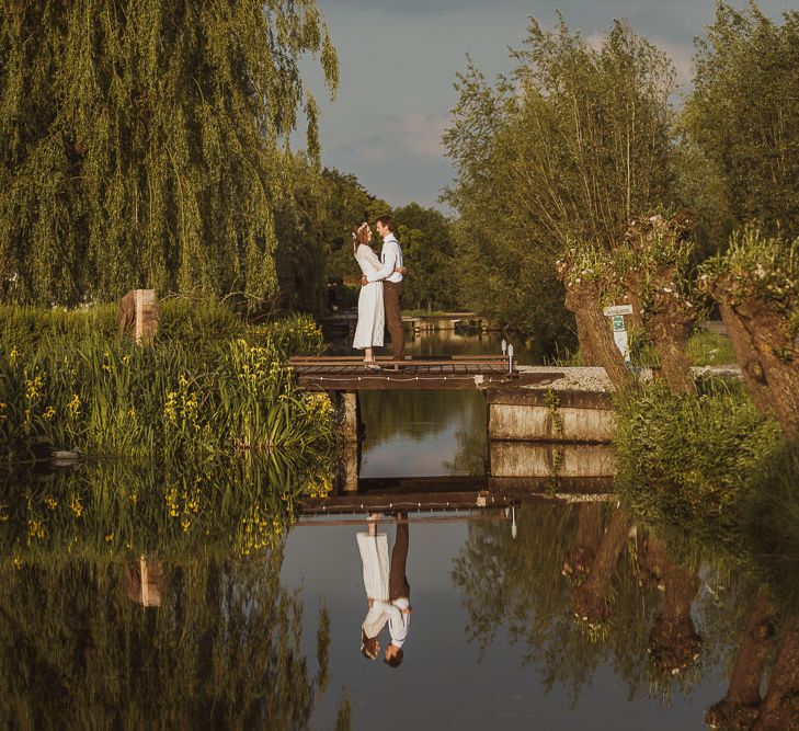 Rustic DIY Wedding In The Netherlands With Bride In Tea Length Vintage Gown And Images From Neil Jackson Photographic With Vintage Mint Green VW Beetle