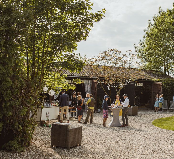 Rustic DIY Wedding In The Netherlands With Bride In Tea Length Vintage Gown And Images From Neil Jackson Photographic With Vintage Mint Green VW Beetle