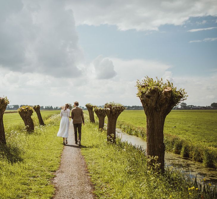 Rustic DIY Wedding In The Netherlands With Bride In Tea Length Vintage Gown And Images From Neil Jackson Photographic With Vintage Mint Green VW Beetle