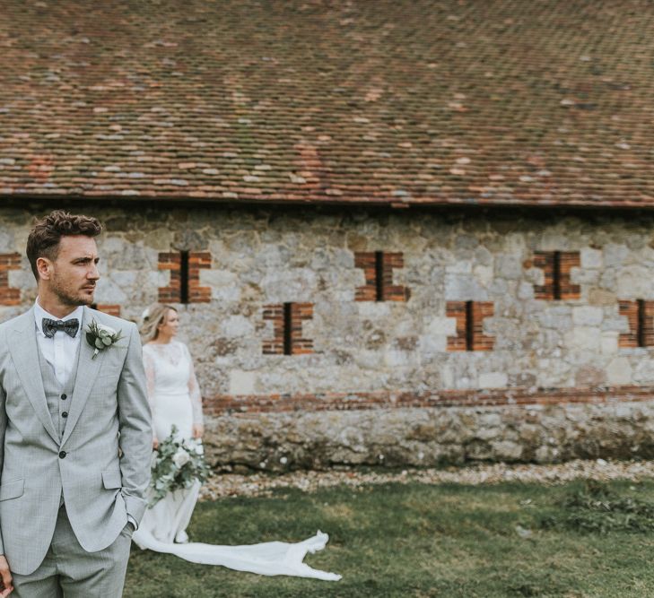 Groomswear // Light Grey Suit With Matching Waistcoat And Navy Bowtie