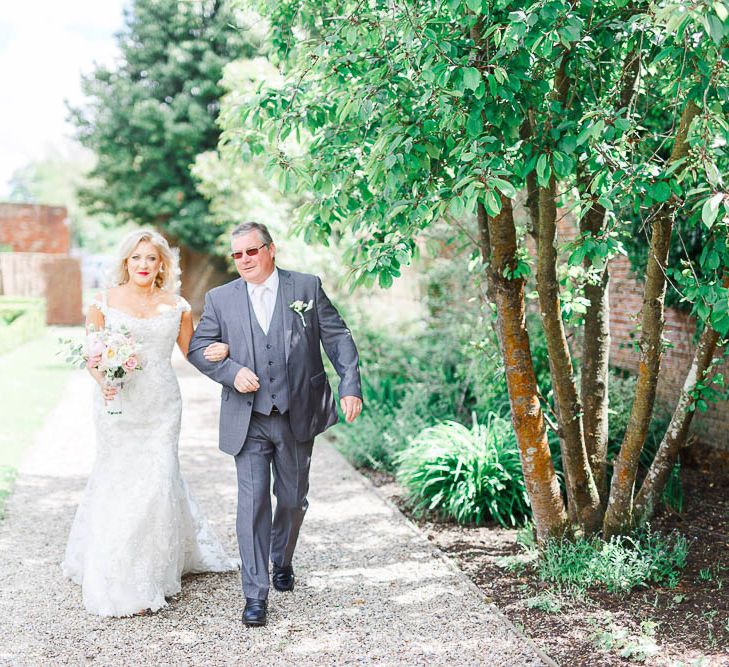 Bridal Entrance | Sottero & Midgley Marigold Gown | The Secret Garden Wedding Venue in Essex | White Stag Wedding Photography