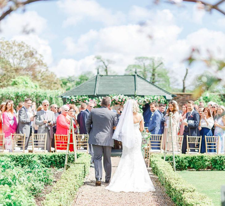 Bridal Entrance | Sottero & Midgley Marigold Gown | The Secret Garden Wedding Venue in Essex | White Stag Wedding Photography