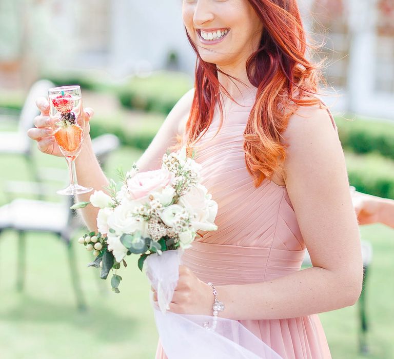 Bridesmaid in Blush Pink Dress | The Secret Garden Wedding Venue in Essex | White Stag Wedding Photography