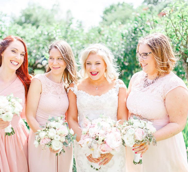 Bridesmaids in different Blush Pink Dresses | Bride in Sottero & Midgley Beaded Gown | White Stag Wedding Photography