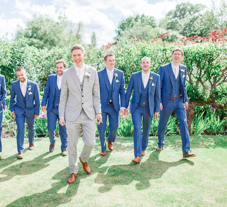 Groom in Light Grey Reiss Suit | Groomsmen in Navy Moss Bros Suits | White Stag Wedding Photography